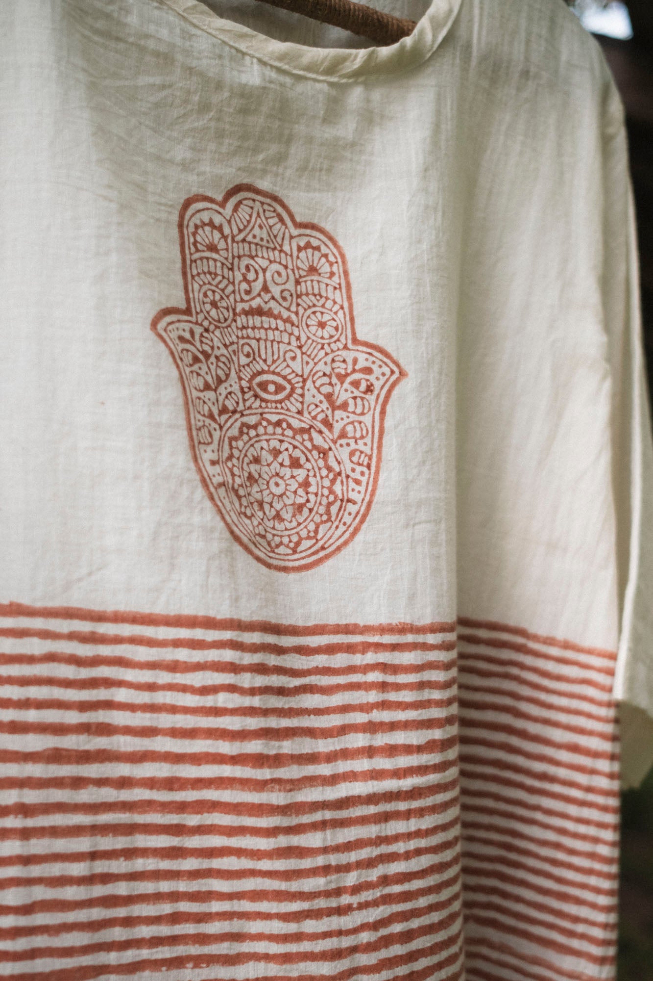files/organic-mulmul-cotton-kurta-rust-hand-motif-stripe-detail.jpg