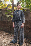 Speckled wide leg pants in anthracite made from 100% cotton, shown worn in a relaxed fit.