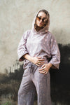 Speckled wide leg pants in dusty pink made from 100% cotton, shown worn in a relaxed fit.